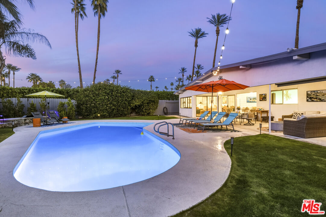 37223 Ferber Drive Rancho Mirage, CA 92270 - Photo 41 of 48 a swimming pool with outdoor seating and yard