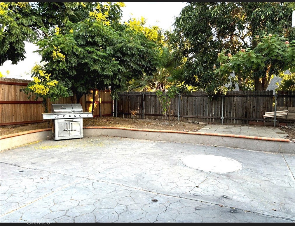 1164 Massachusetts Avenue Riverside, CA 92507 - Photo 14 of 14 a view of swimming pool with a small yard