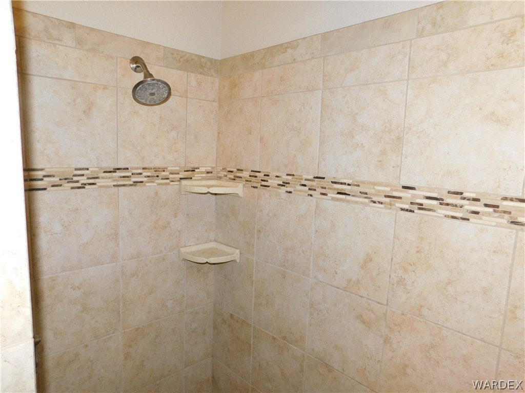 3370 South Ridge Avenue Bullhead City, AZ 86429 - Photo 38 of 56 a bathroom with a shower