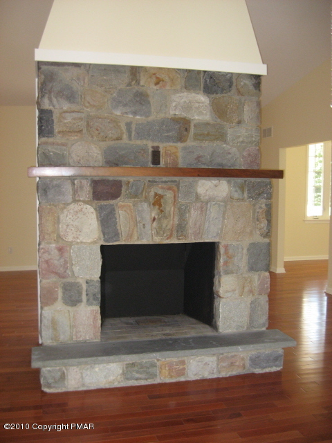 8123 Cays Road Stroudsburg, PA 18360 - Photo 8 of 16 Natural stone fireplace
