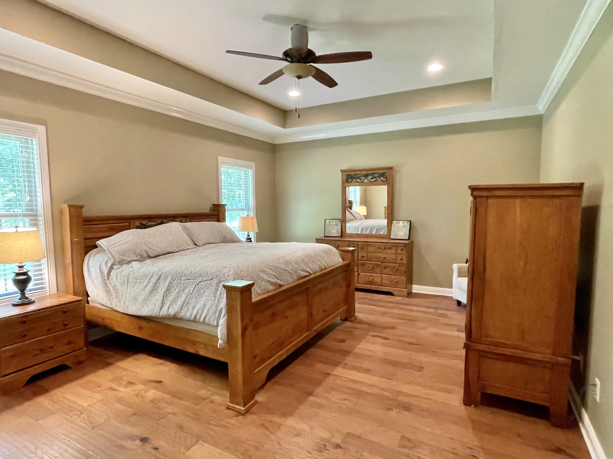 470 Clarks Store Sinking Fork Road Cerulean, KY 42215 - Photo 19 of 42 a bedroom with a bed and a chandelier