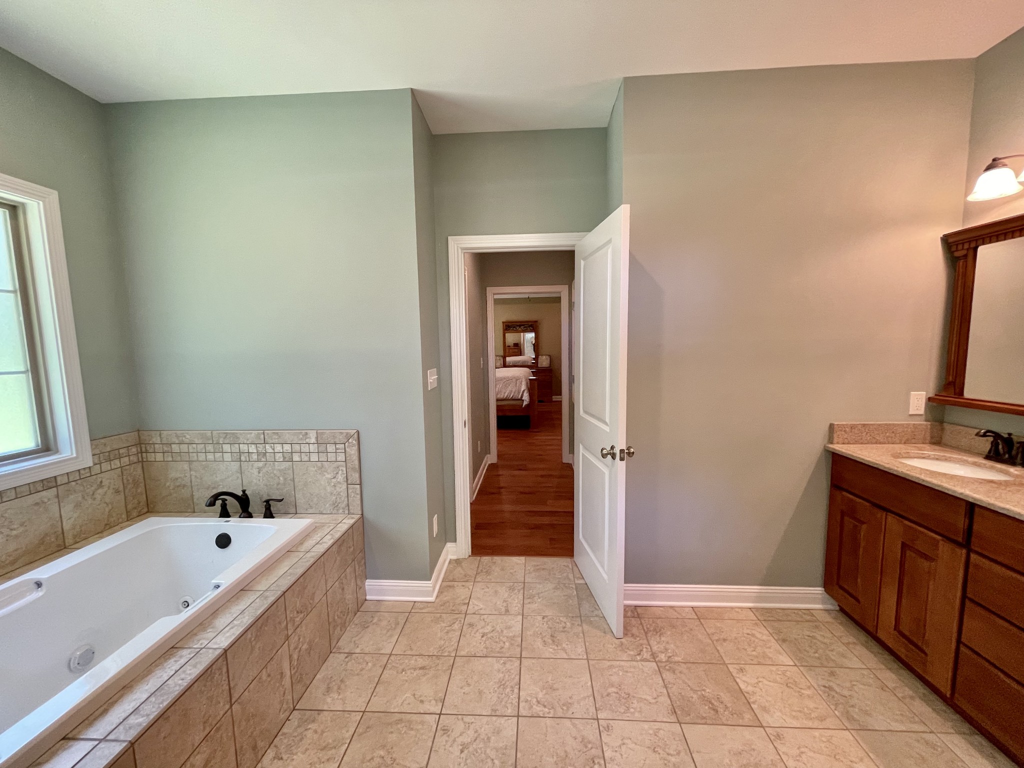 470 Clarks Store Sinking Fork Road Cerulean, KY 42215 - Photo 22 of 42 a bathroom with a bathtub sink and mirror