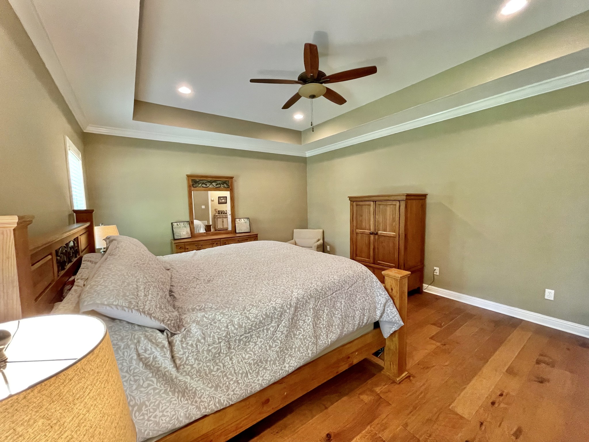 470 Clarks Store Sinking Fork Road Cerulean, KY 42215 - Photo 25 of 42 a bedroom with a bed and a chandelier
