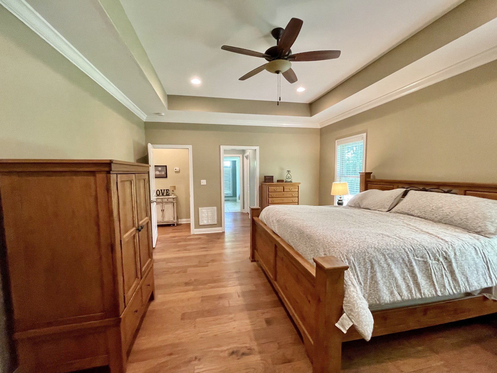 470 Clarks Store Sinking Fork Road Cerulean, KY 42215 - Photo 26 of 42 a spacious bedroom with a bed and a ceiling fan