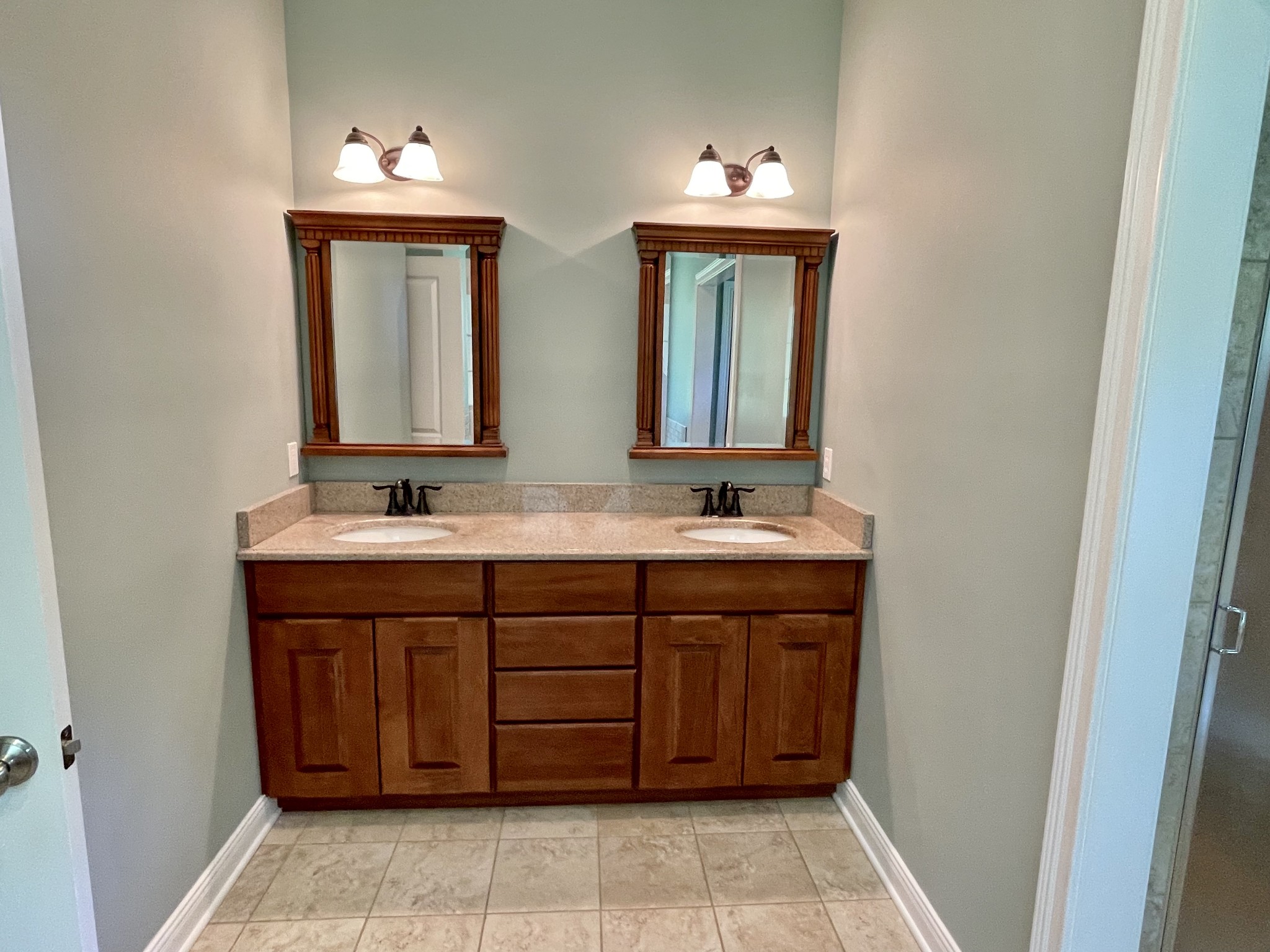 470 Clarks Store Sinking Fork Road Cerulean, KY 42215 - Photo 27 of 42 a bathroom with a double vanity sink and a mirror