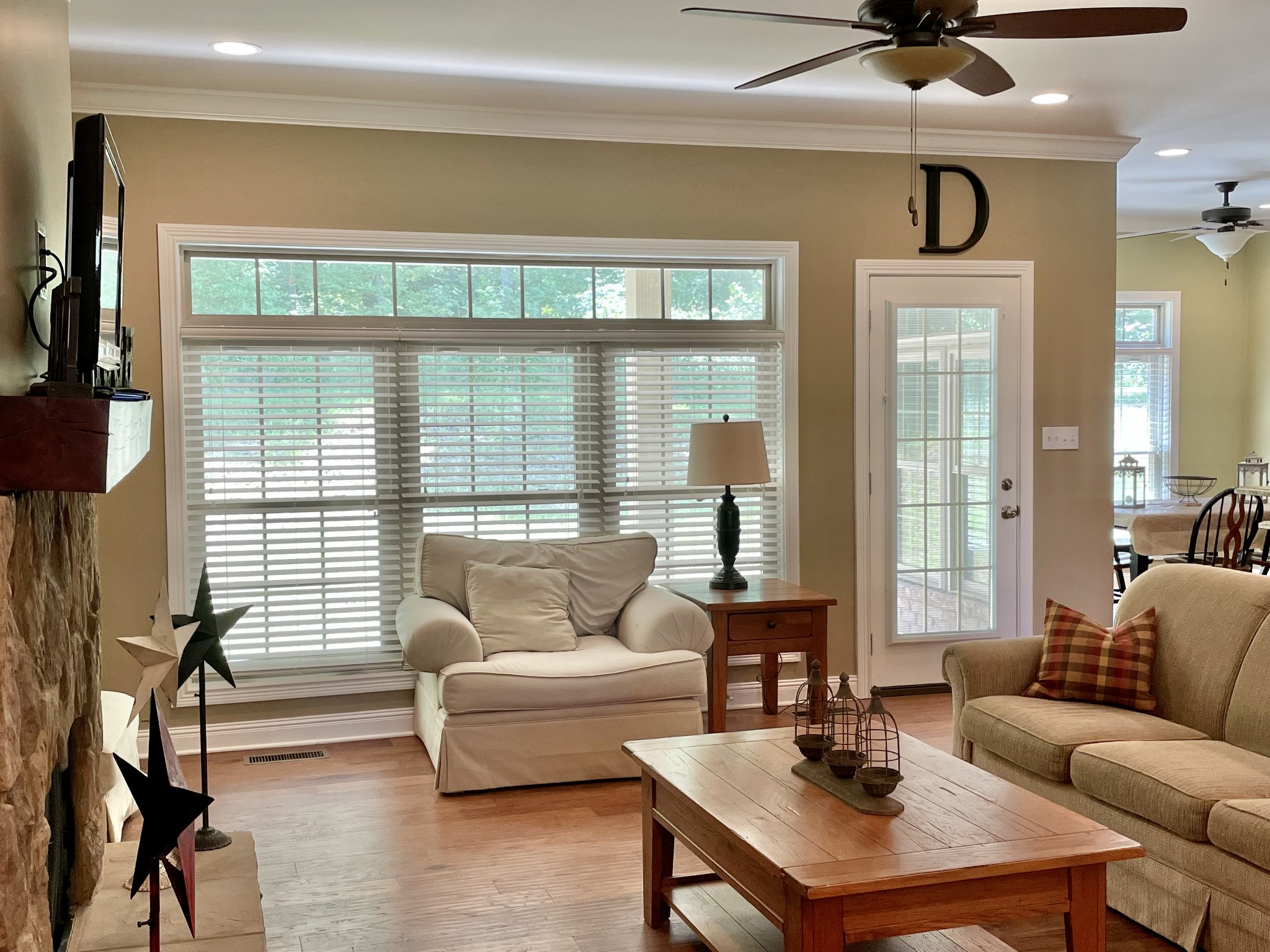 470 Clarks Store Sinking Fork Road Cerulean, KY 42215 - Photo 4 of 42 a living room with furniture a ceiling fan and a large window