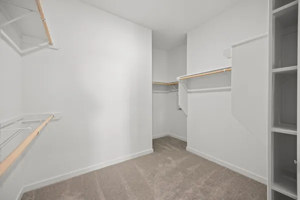 a bathroom with a double vanity sink and mirror