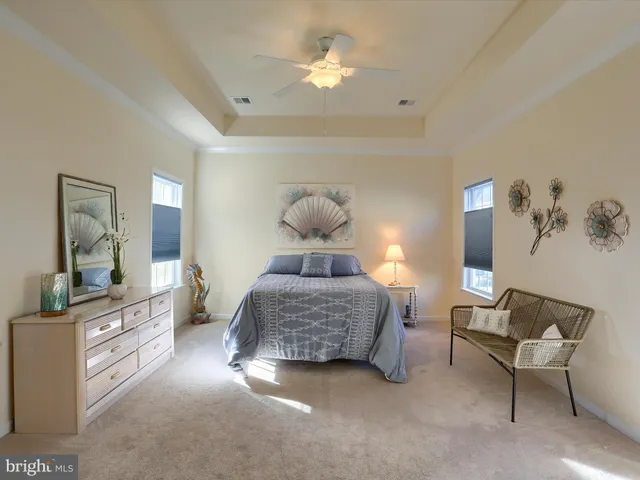a bedroom with a bed and furniture
