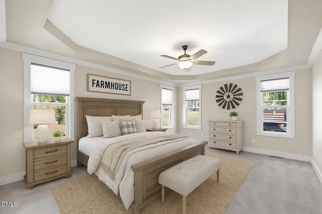 a bedroom with a bed and a table