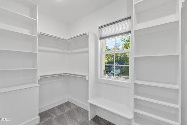 a view of an empty walk in closet