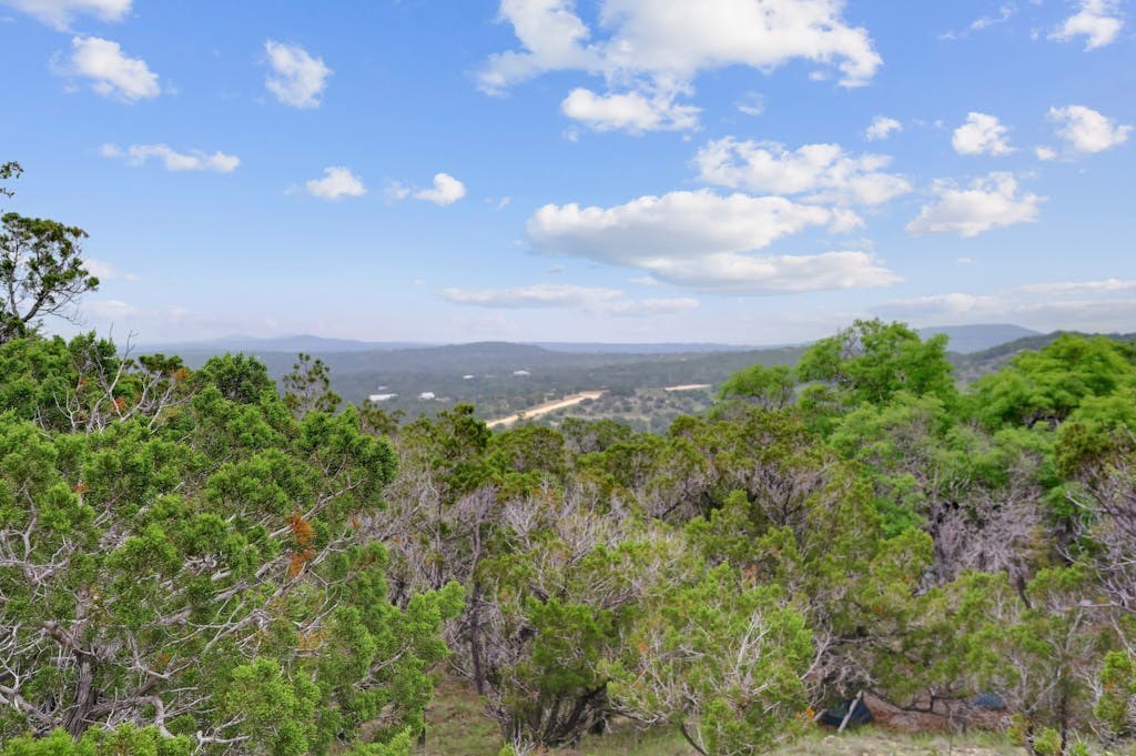 107 Sumac Ridge, Unit 159 Kendalia, TX 78027 - Photo 17 of 30 a view of a bunch of trees