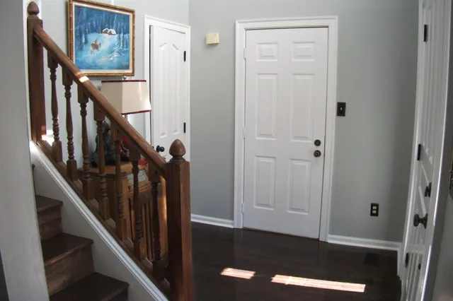a view of hallway with stairs