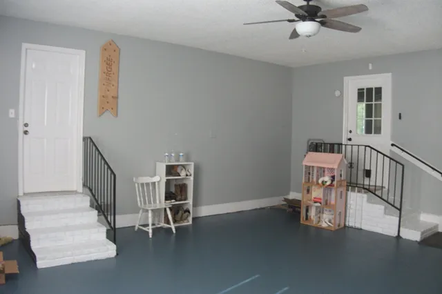 a view of a hallway with workspace
