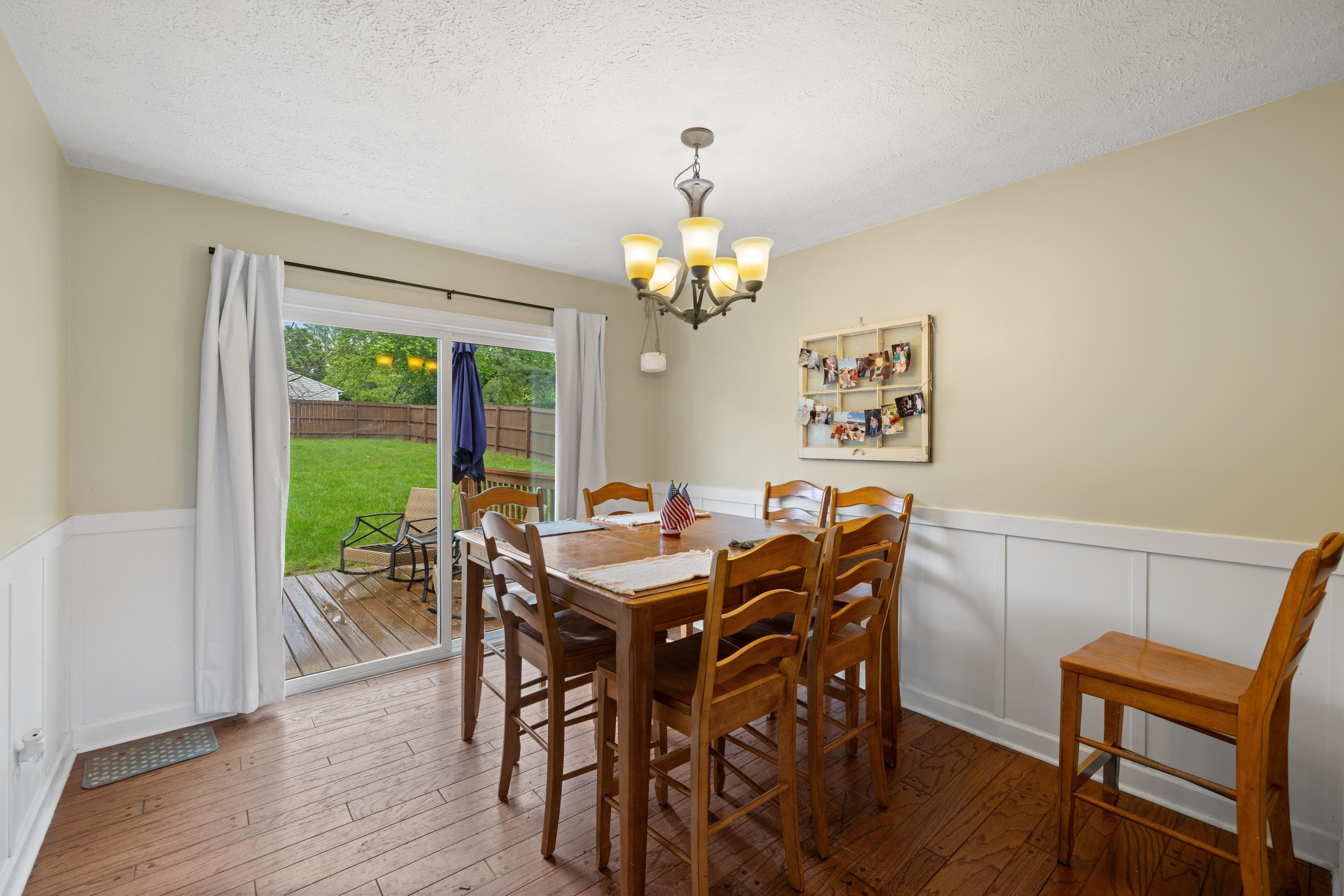 701 Horseshoe Circle Stuarts Draft, VA 24477 - Photo 18 of 70 a view of a dining room with furniture window and wooden floor