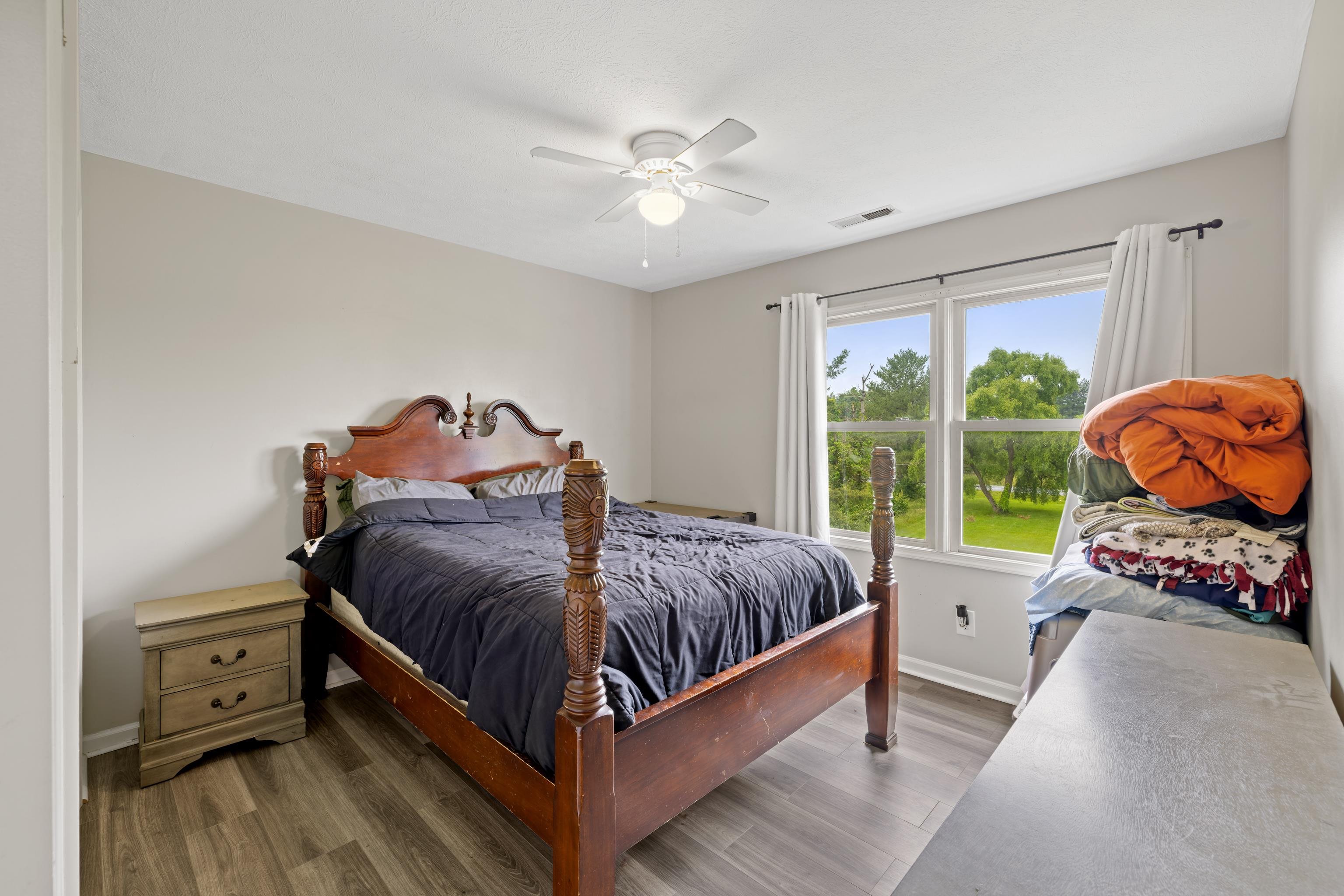 701 Horseshoe Circle Stuarts Draft, VA 24477 - Photo 30 of 70 a bedroom with a bed and a window