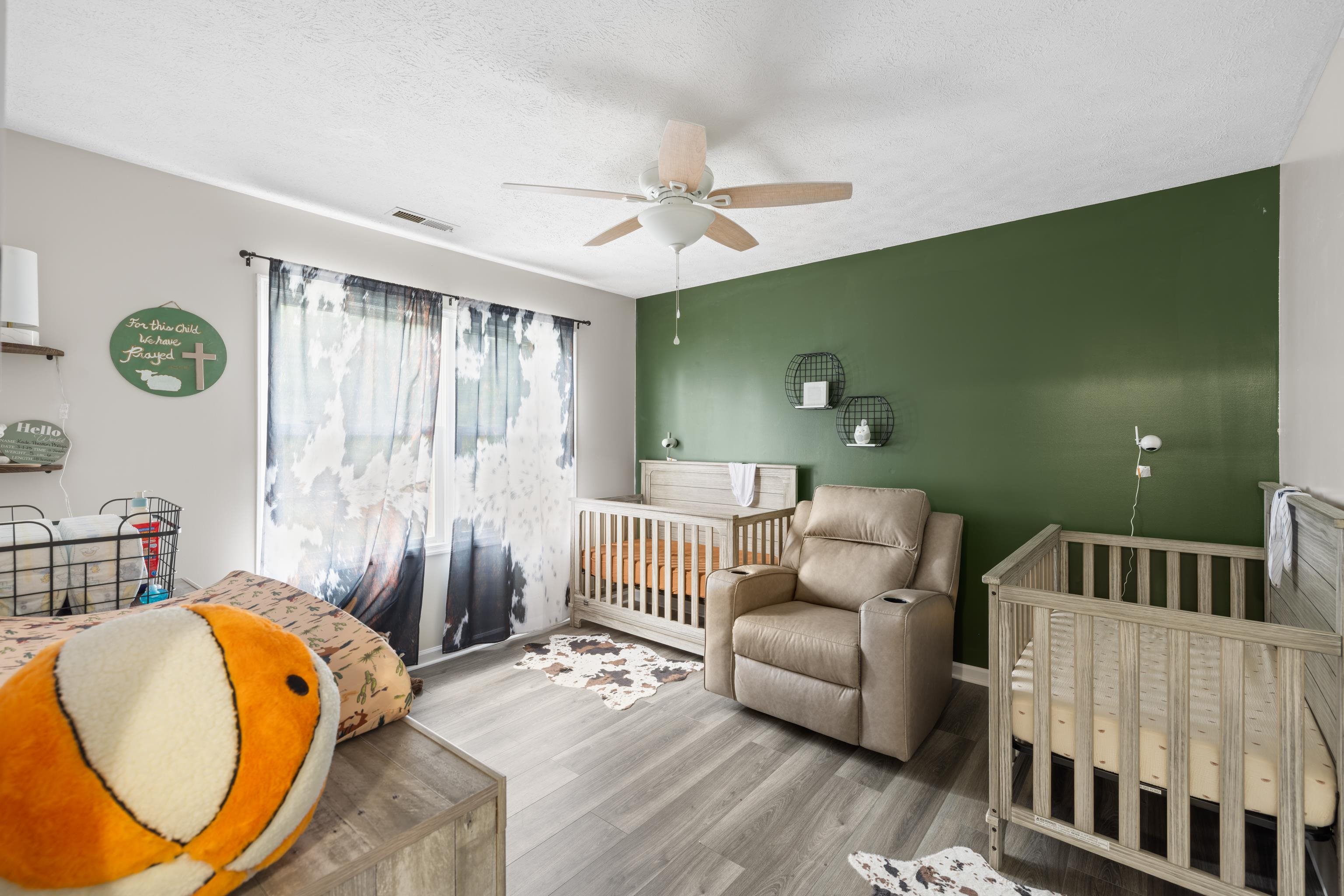 701 Horseshoe Circle Stuarts Draft, VA 24477 - Photo 38 of 70 a living room with furniture and a wooden floor