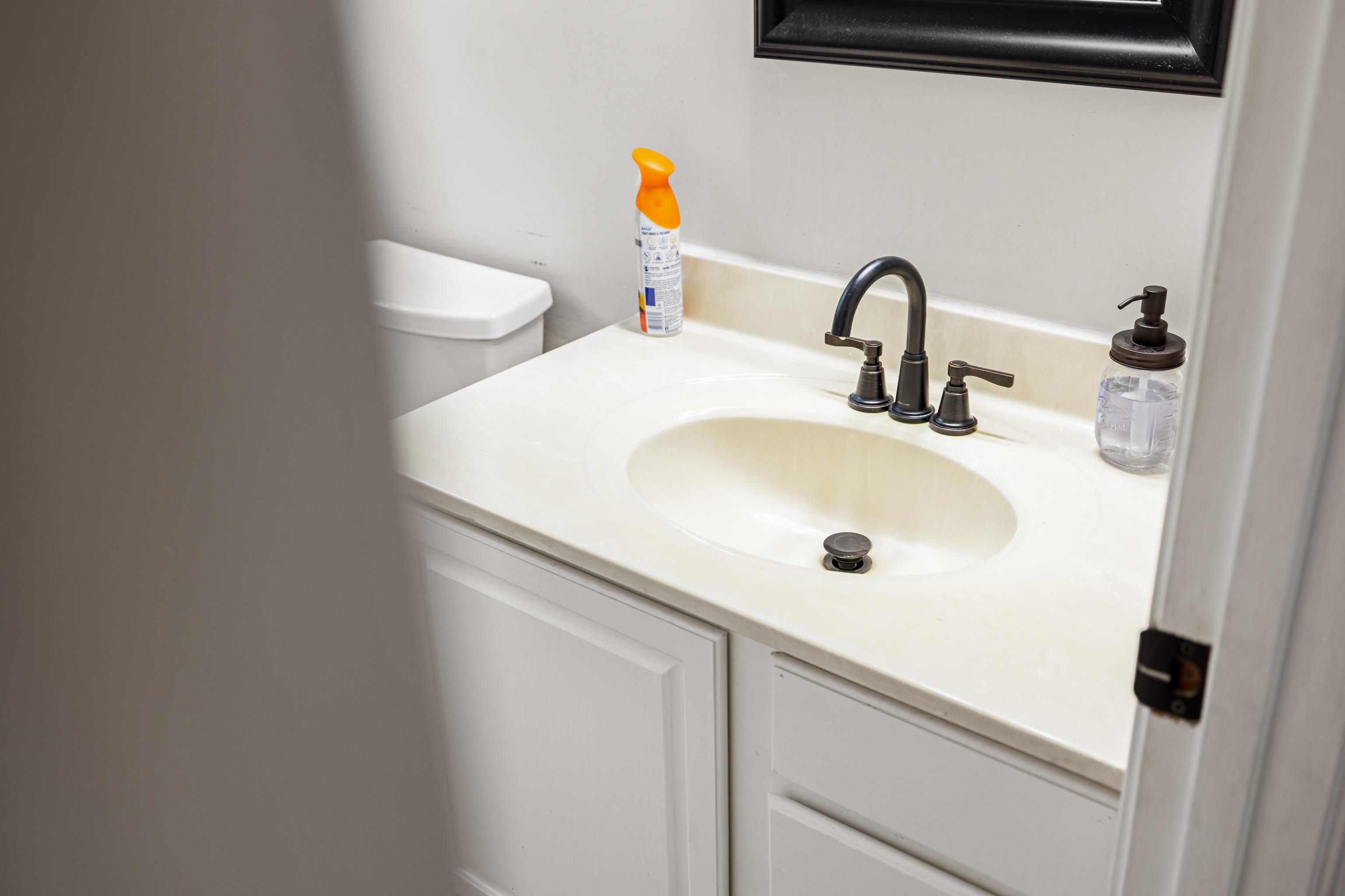 701 Horseshoe Circle Stuarts Draft, VA 24477 - Photo 41 of 70 a bathroom with a sink and a toilet