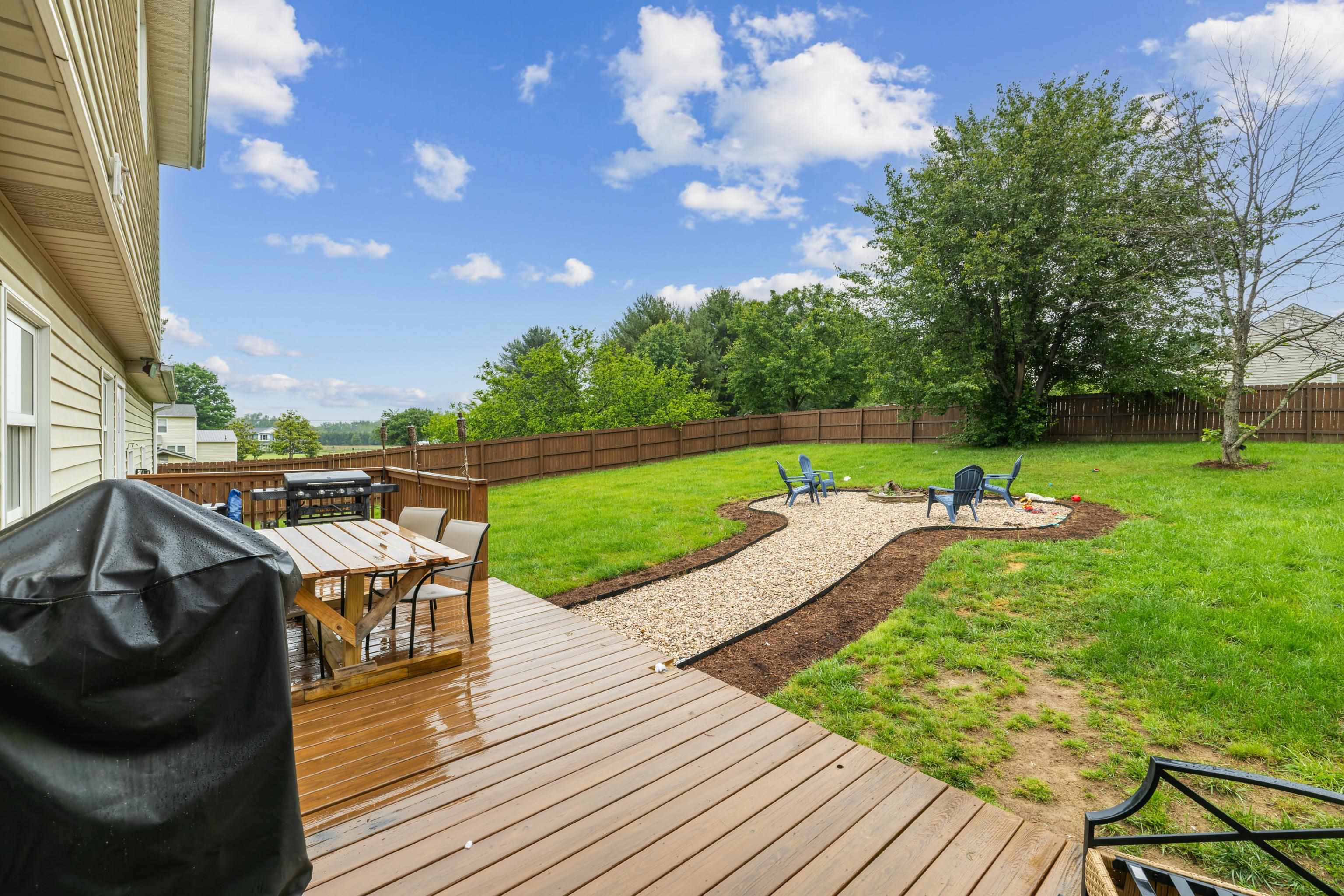 701 Horseshoe Circle Stuarts Draft, VA 24477 - Photo 45 of 70 a view of a chairs and table on the wooden floor
