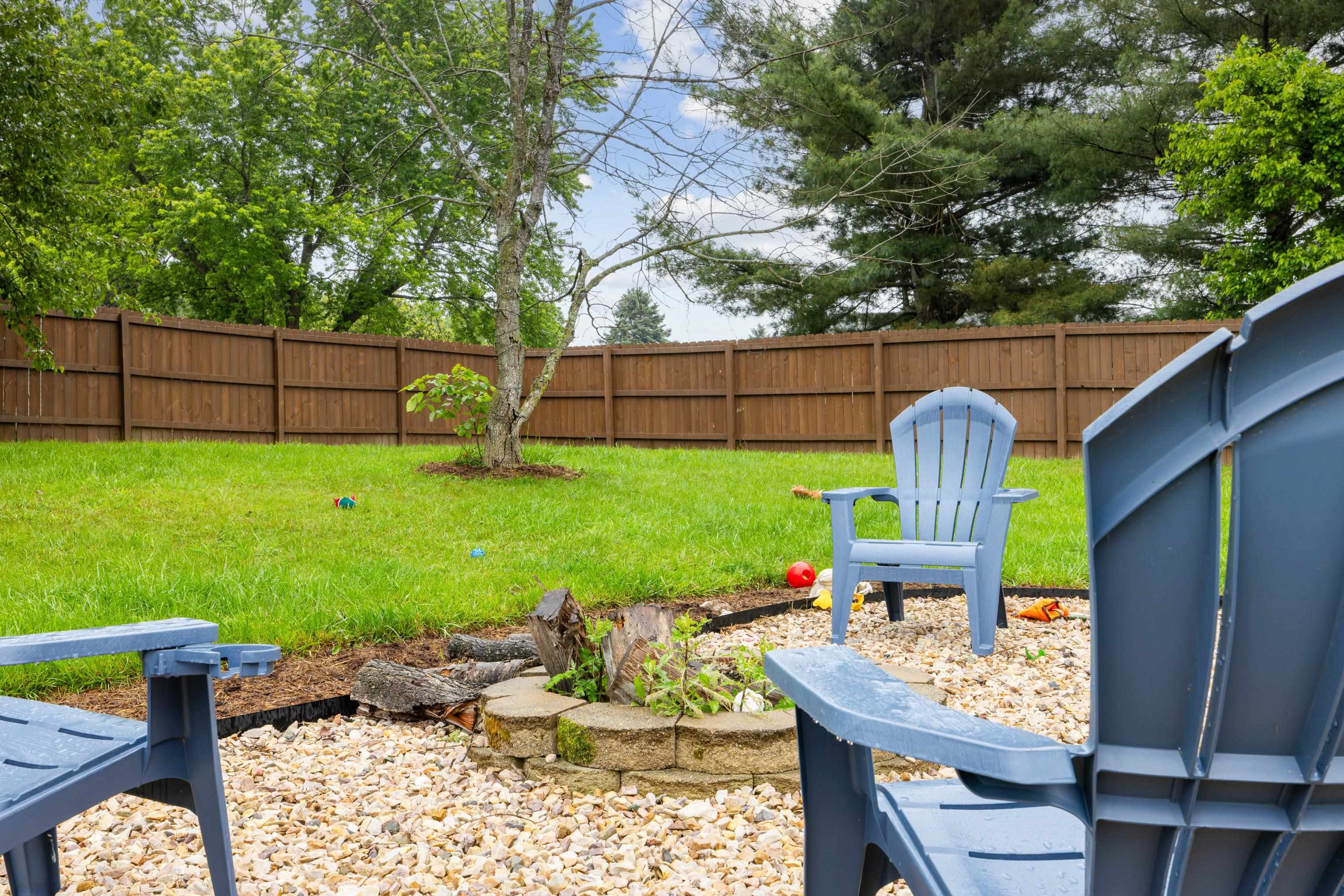 701 Horseshoe Circle Stuarts Draft, VA 24477 - Photo 46 of 70 a view of backyard with seating space and trees
