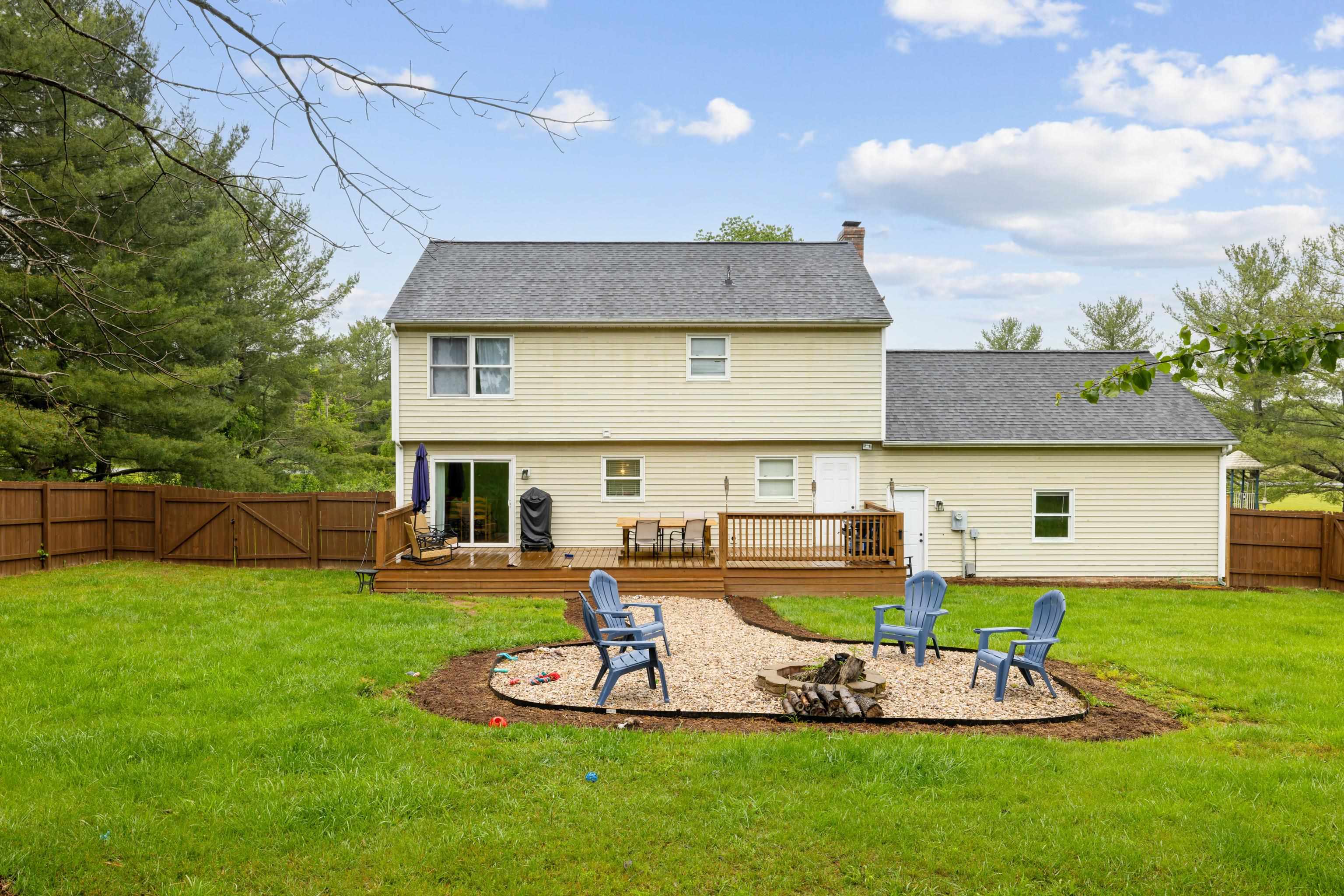 701 Horseshoe Circle Stuarts Draft, VA 24477 - Photo 51 of 70 a view of a house with a yard porch and sitting area