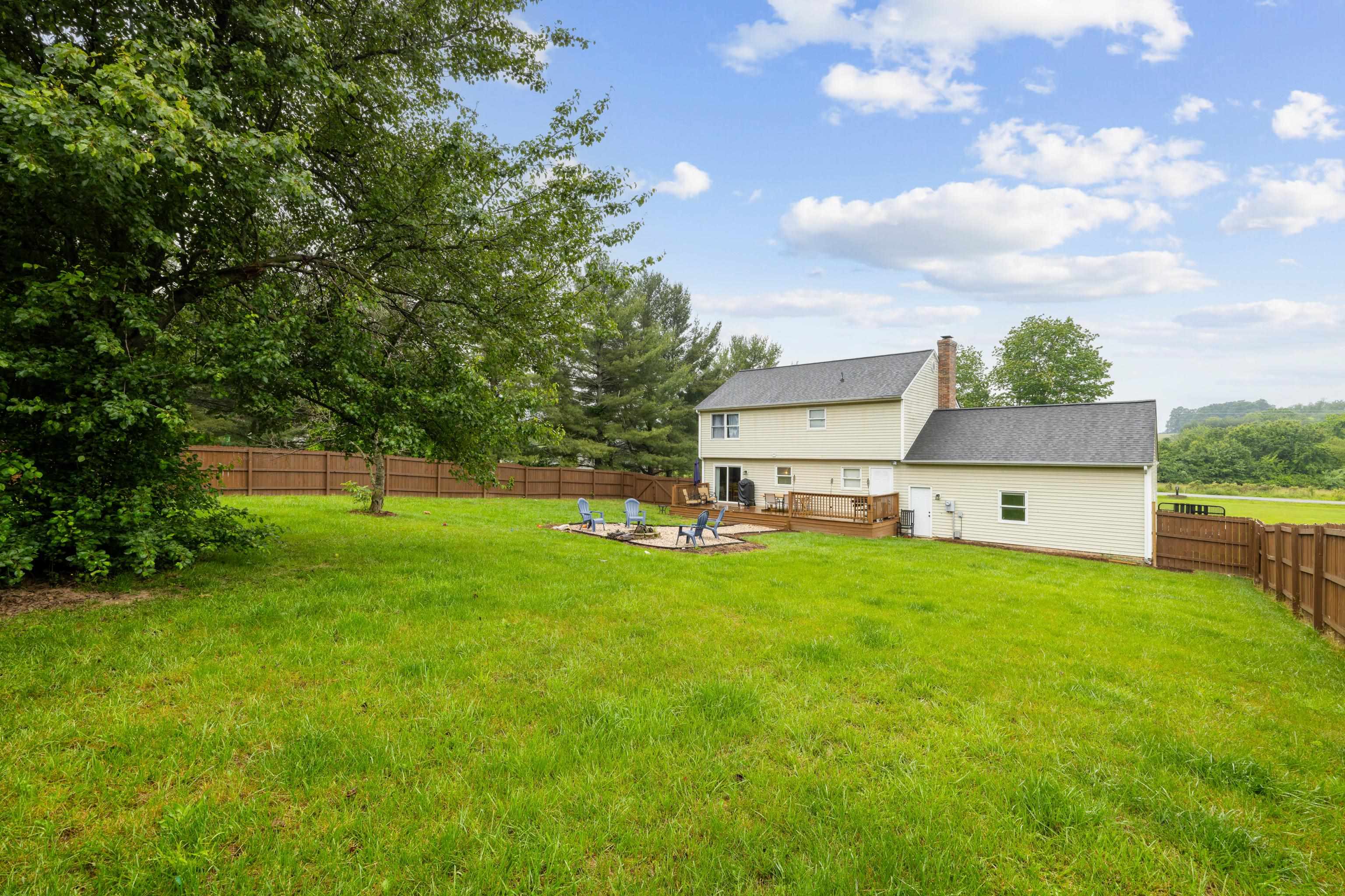 701 Horseshoe Circle Stuarts Draft, VA 24477 - Photo 53 of 70 a view of a house with a yard porch and sitting area