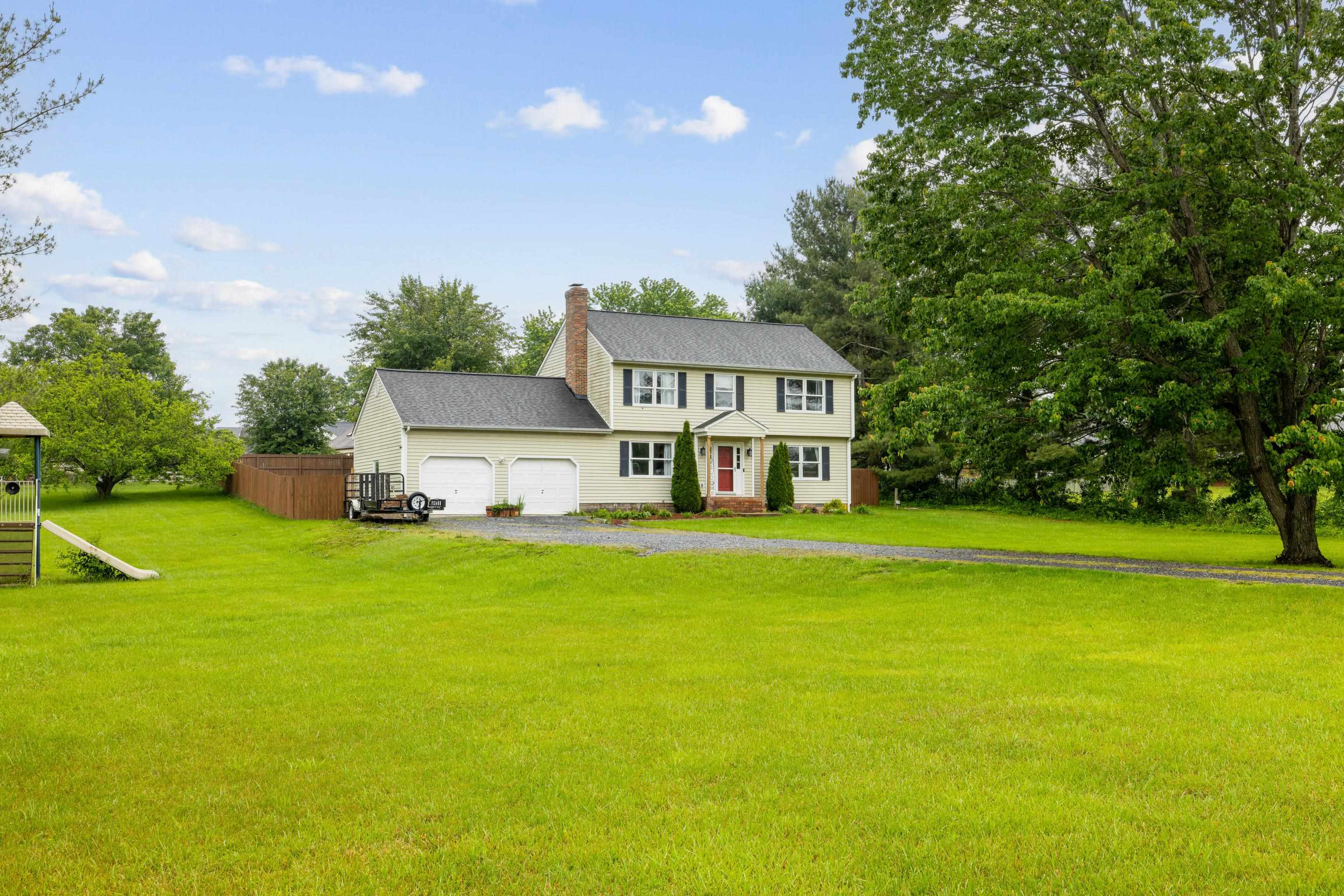 701 Horseshoe Circle Stuarts Draft, VA 24477 - Photo 67 of 70 a view of a house with a big yard and large trees