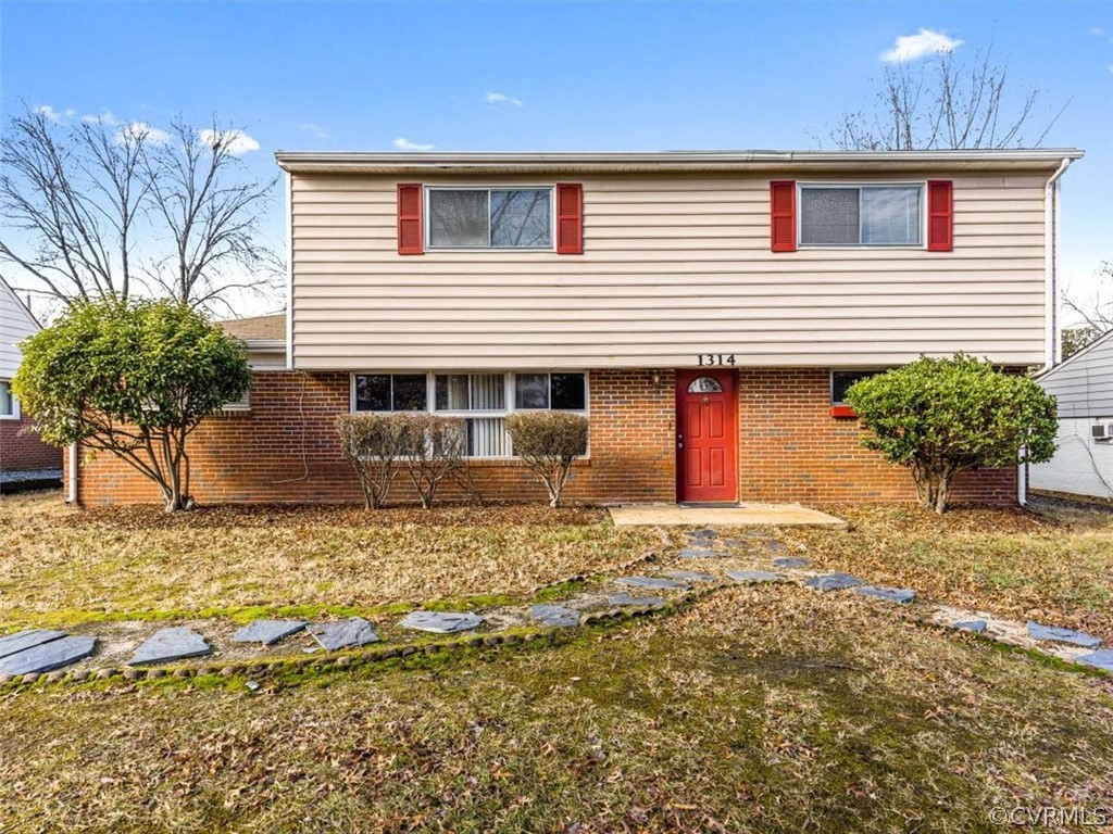 1314 Andover Road Henrico, VA 23229 - Photo 1 of 24 a view of a house with a yard