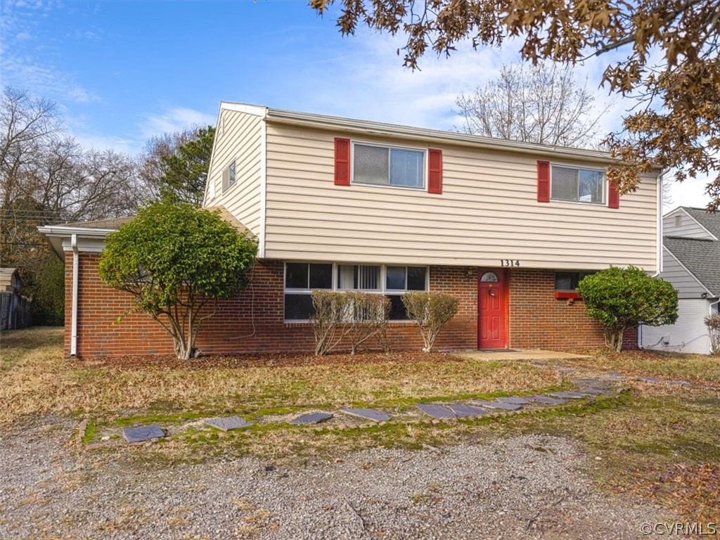 1314 Andover Road Henrico, VA 23229 - Photo 2 of 24 a front view of a house with garden
