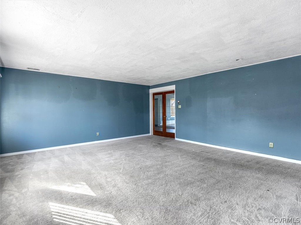 1314 Andover Road Henrico, VA 23229 - Photo 4 of 24 a view of an empty room with a window