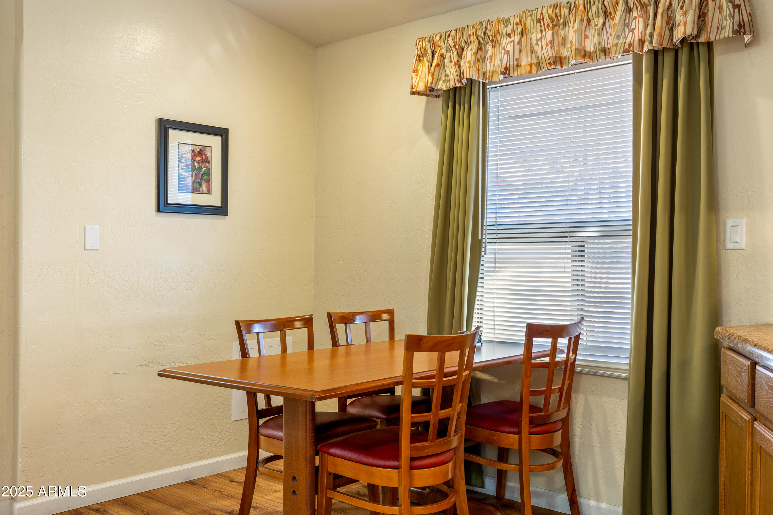 5829 East Buck Springs Road, Unit 200 Pinetop, AZ 85935 - Photo 5 of 18 a view of a dining room with furniture and window