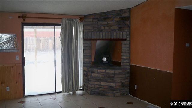 17225 Waxwing Street Reno, NV 89508 - Photo 5 of 13 a bathroom with a shower