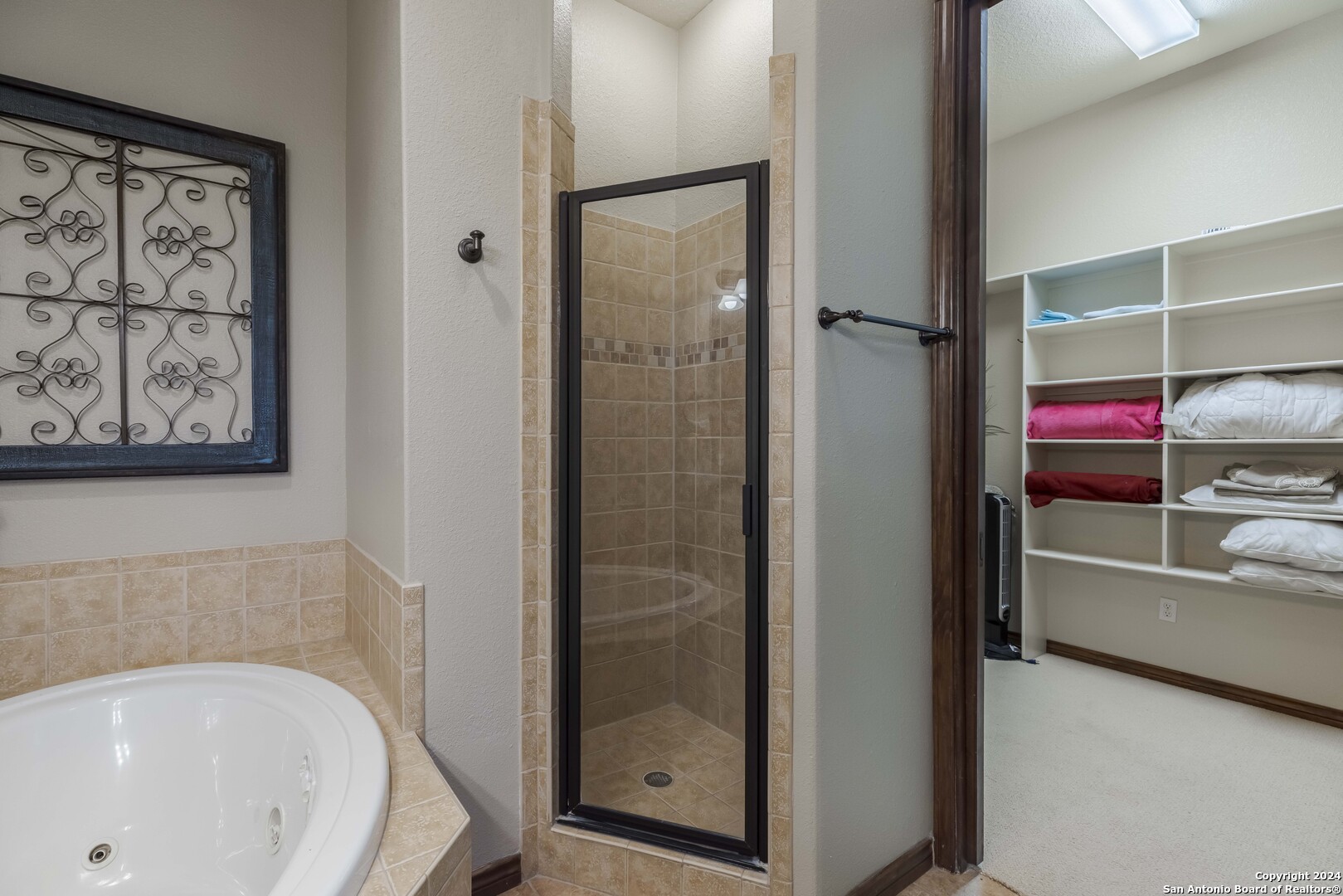 3801-15 Club House Road, Unit 15 Kerrville, TX 78028 - Photo 13 of 26 a bathroom with a tub and shower