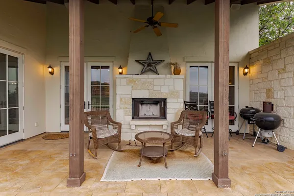 a view of balcony with couch and wooden floor
