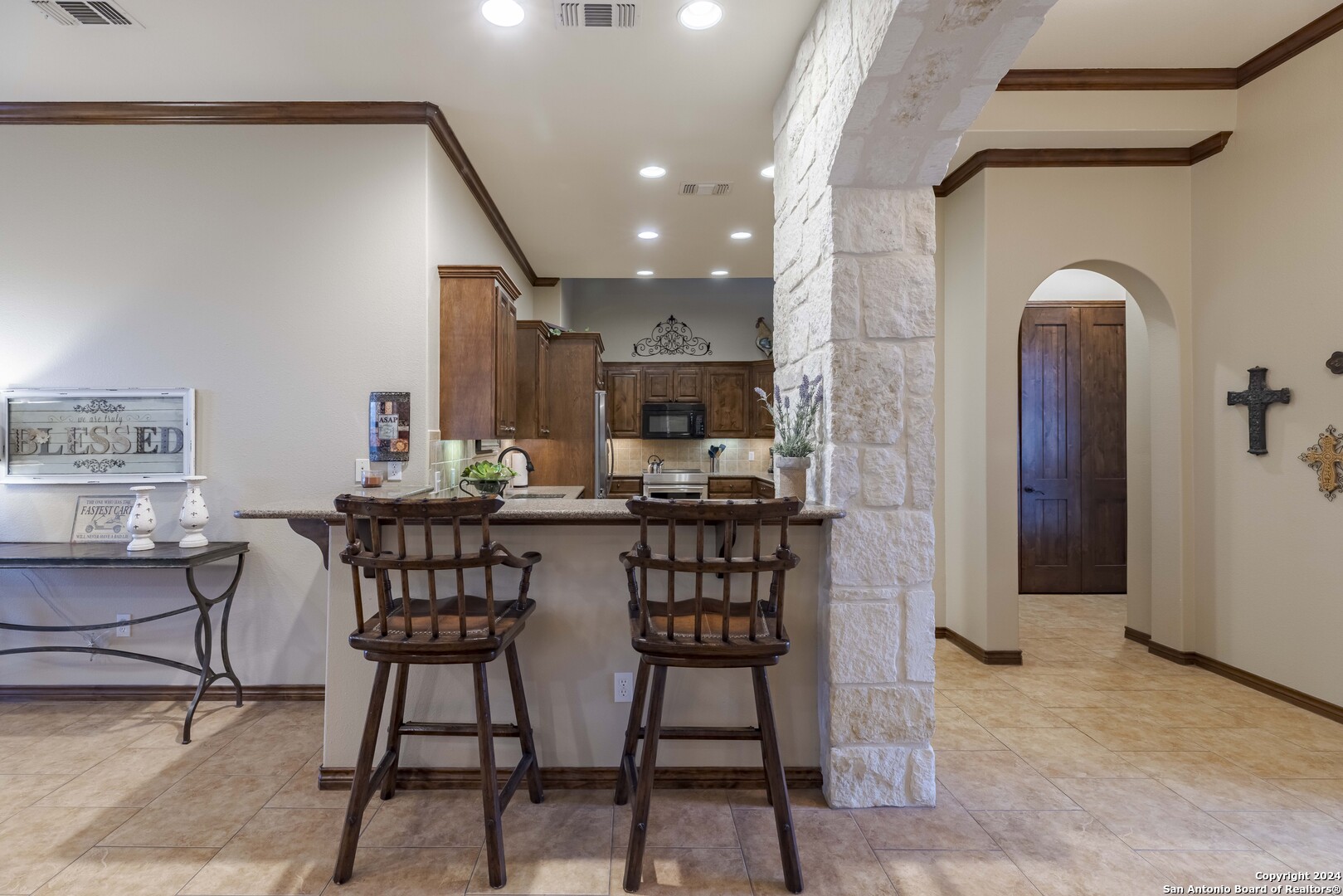 3801-15 Club House Road, Unit 15 Kerrville, TX 78028 - Photo 8 of 26 a dining room with furniture and window