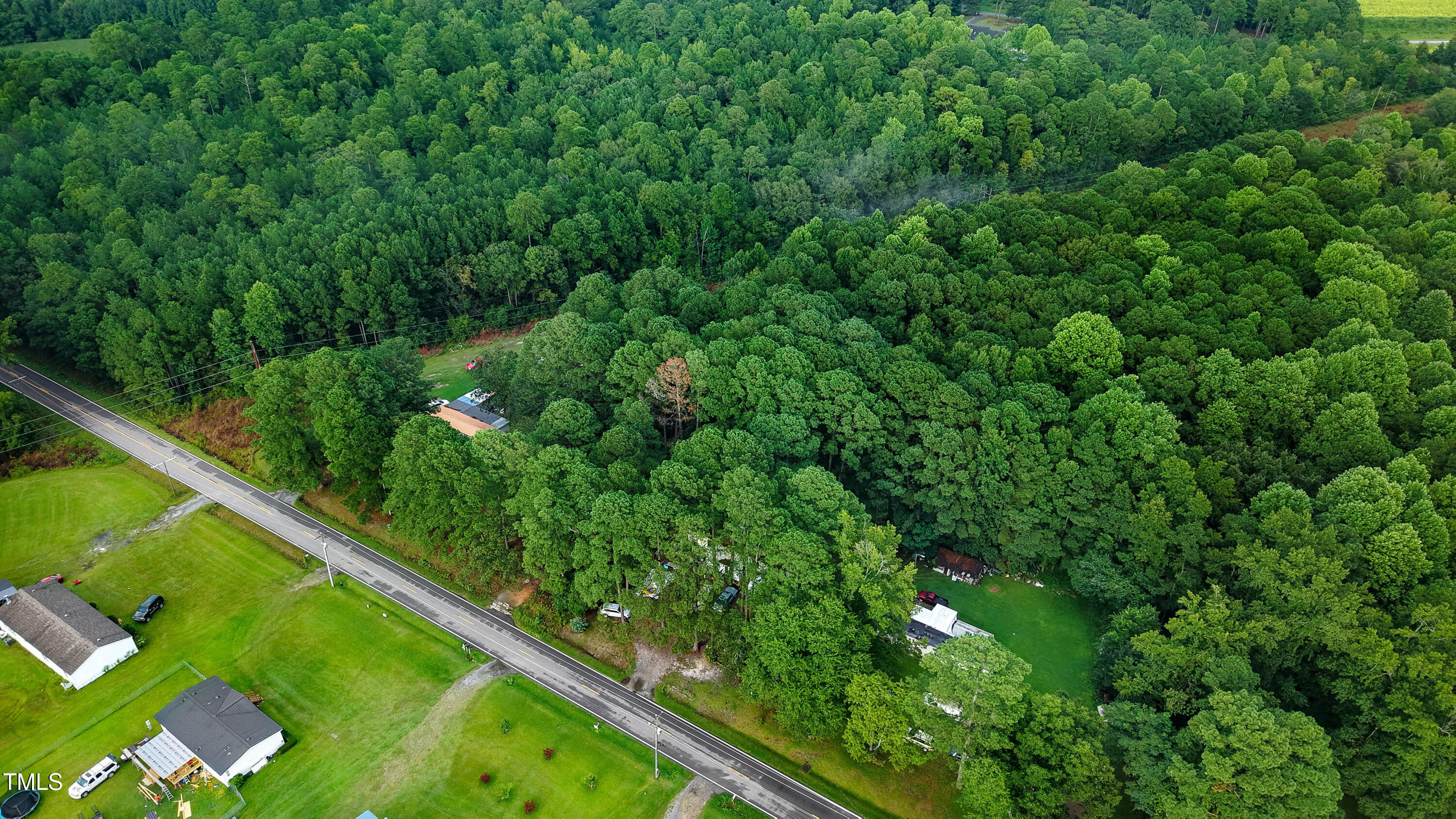 2037 Old Rock Quarry Road Princeton, NC 27569 - Photo 22 of 25 a view of a garden from a balcony
