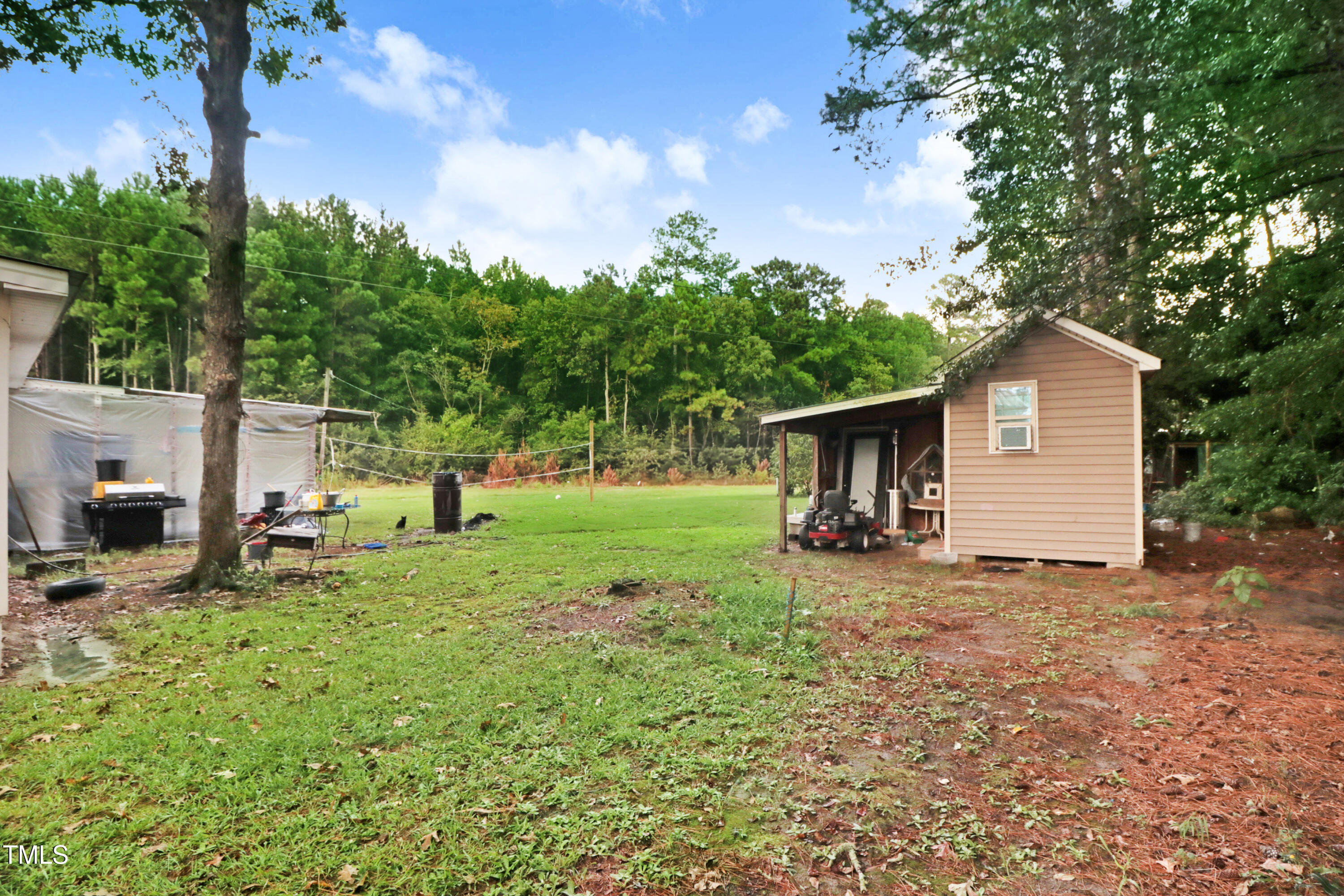 2037 Old Rock Quarry Road Princeton, NC 27569 - Photo 4 of 25 a view of a house with backyard
