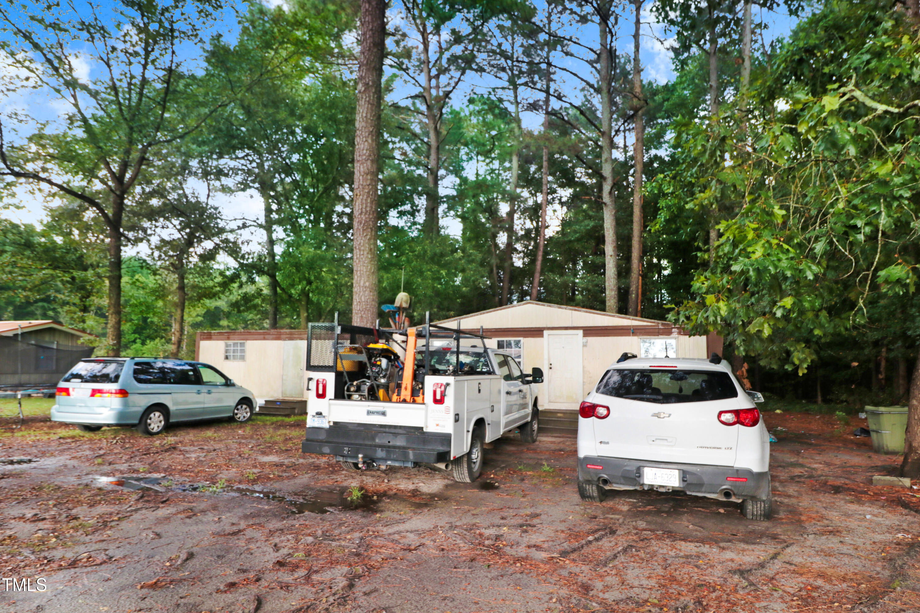 2037 Old Rock Quarry Road Princeton, NC 27569 - Photo 8 of 25 a view of parked cars on a sidewalk