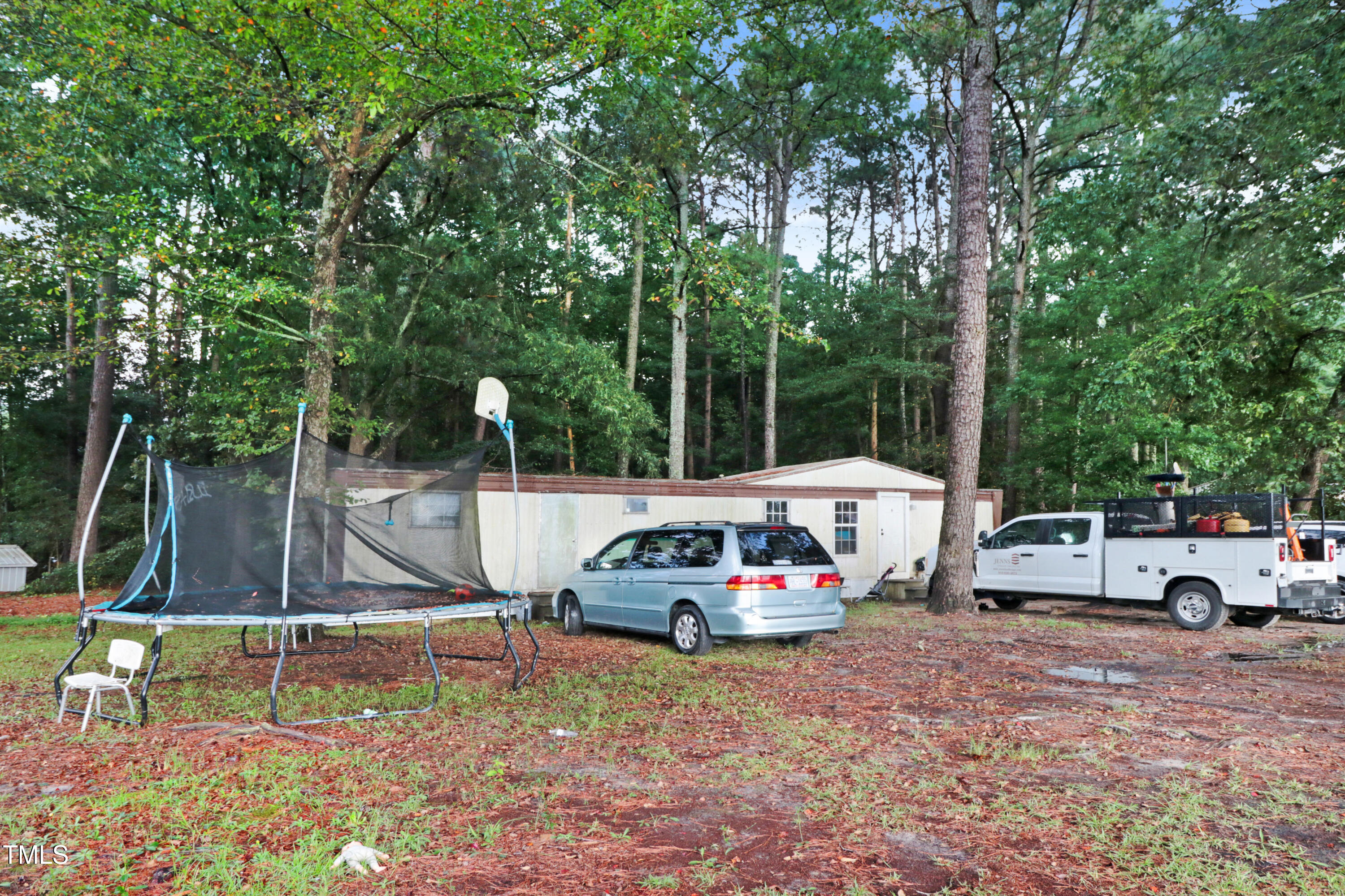 2037 Old Rock Quarry Road Princeton, NC 27569 - Photo 9 of 25 a car parked in front of a house