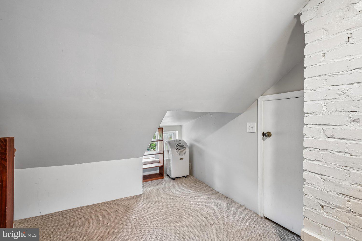 16 Maple Avenue Washington Grove, MD 20880 - Photo 39 of 58 Cozy attic space with charming angles.