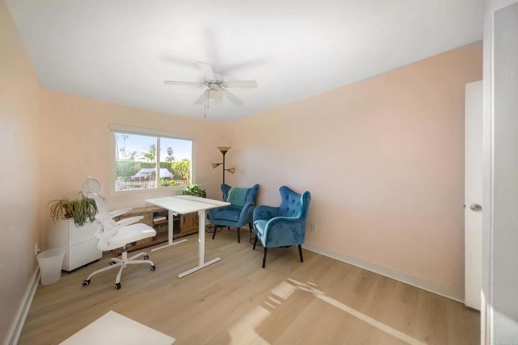 1467 Ronda Place Escondido, CA 92027 - Photo 12 of 26 a view of a workspace with furniture and a window
