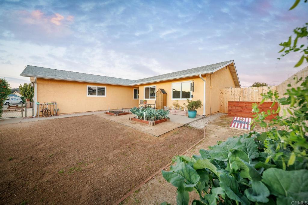 1467 Ronda Place Escondido, CA 92027 - Photo 13 of 26 a view of backyard of a house
