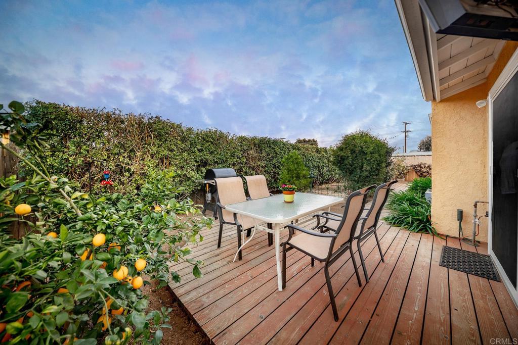 1467 Ronda Place Escondido, CA 92027 - Photo 18 of 26 a view of a backyard with sitting area