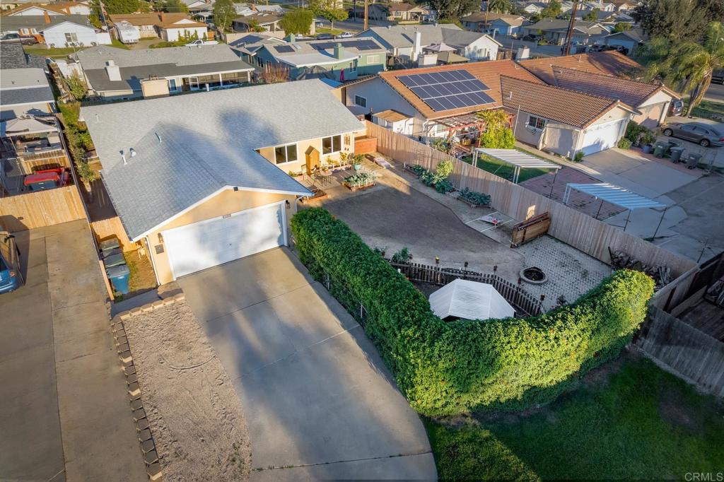 1467 Ronda Place Escondido, CA 92027 - Photo 22 of 26 an aerial view of a house with a garden