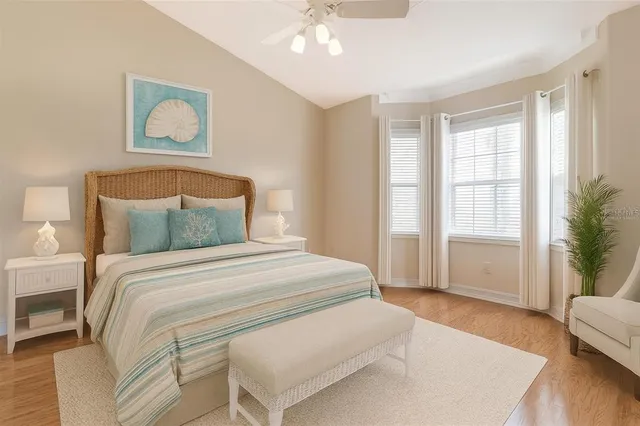 a bathroom with a double vanity sink mirror double and shower