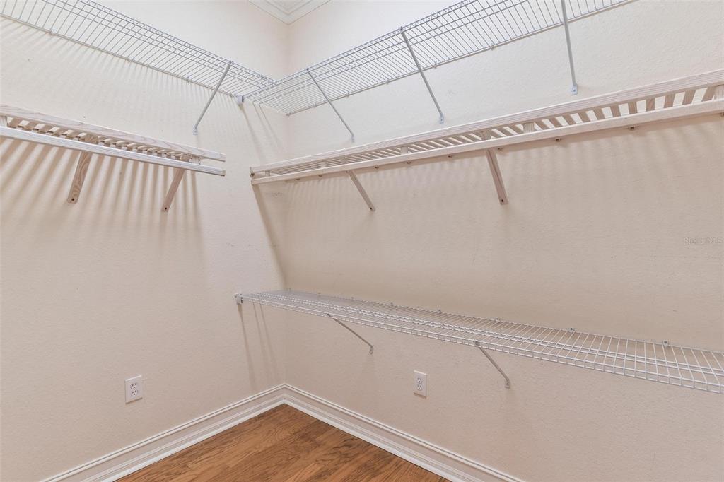 14 Camino Real, Unit 14 Howey-in-the-Hills, FL 34737 - Photo 31 of 62 a view of a room with racks on the wall