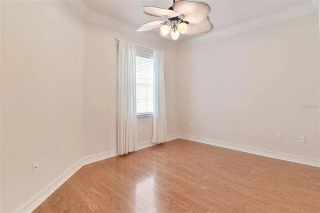 a view of a room with balcony and furniture