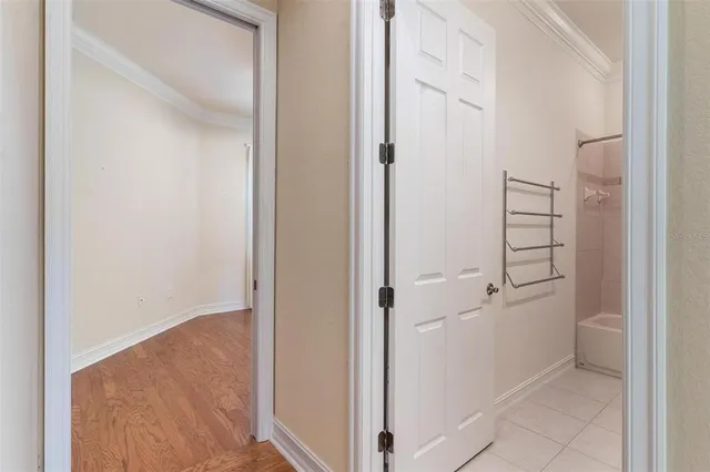 a bathroom with a shower and a curtain