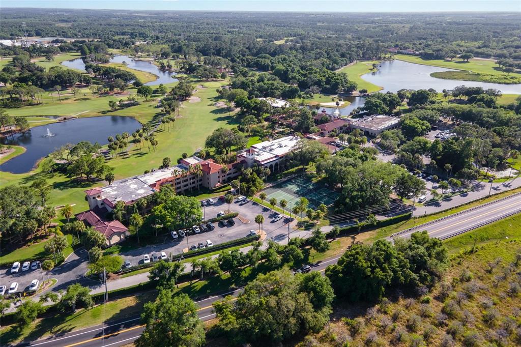 14 Camino Real, Unit 14 Howey-in-the-Hills, FL 34737 - Photo 59 of 62 an aerial view of residential houses with outdoor space and swimming pool