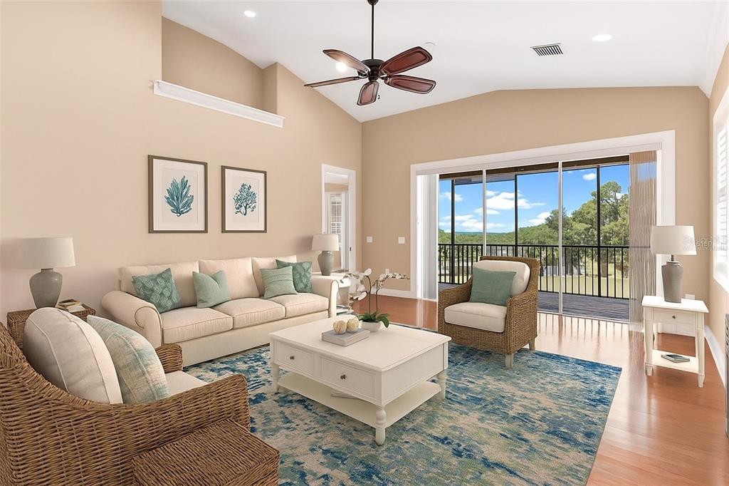 14 Camino Real, Unit 14 Howey-in-the-Hills, FL 34737 - Photo 6 of 62 a living room with furniture a ceiling fan and a floor to ceiling window