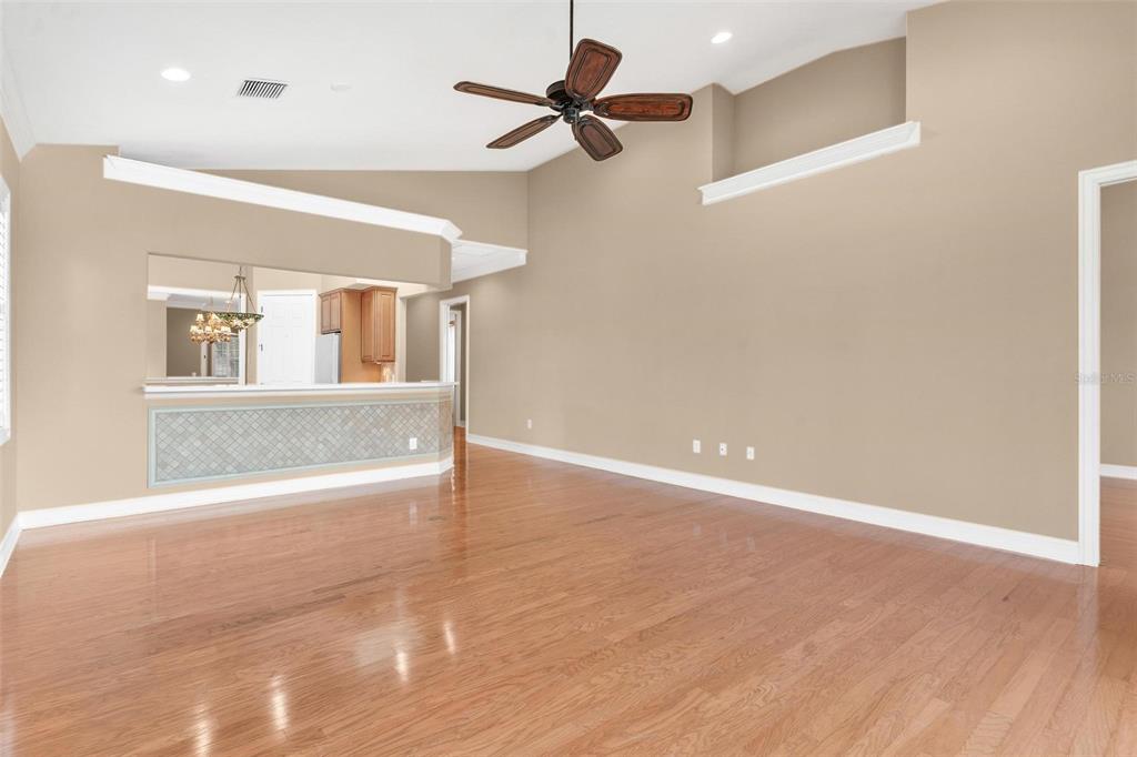 14 Camino Real, Unit 14 Howey-in-the-Hills, FL 34737 - Photo 8 of 62 a view of an empty room with a window